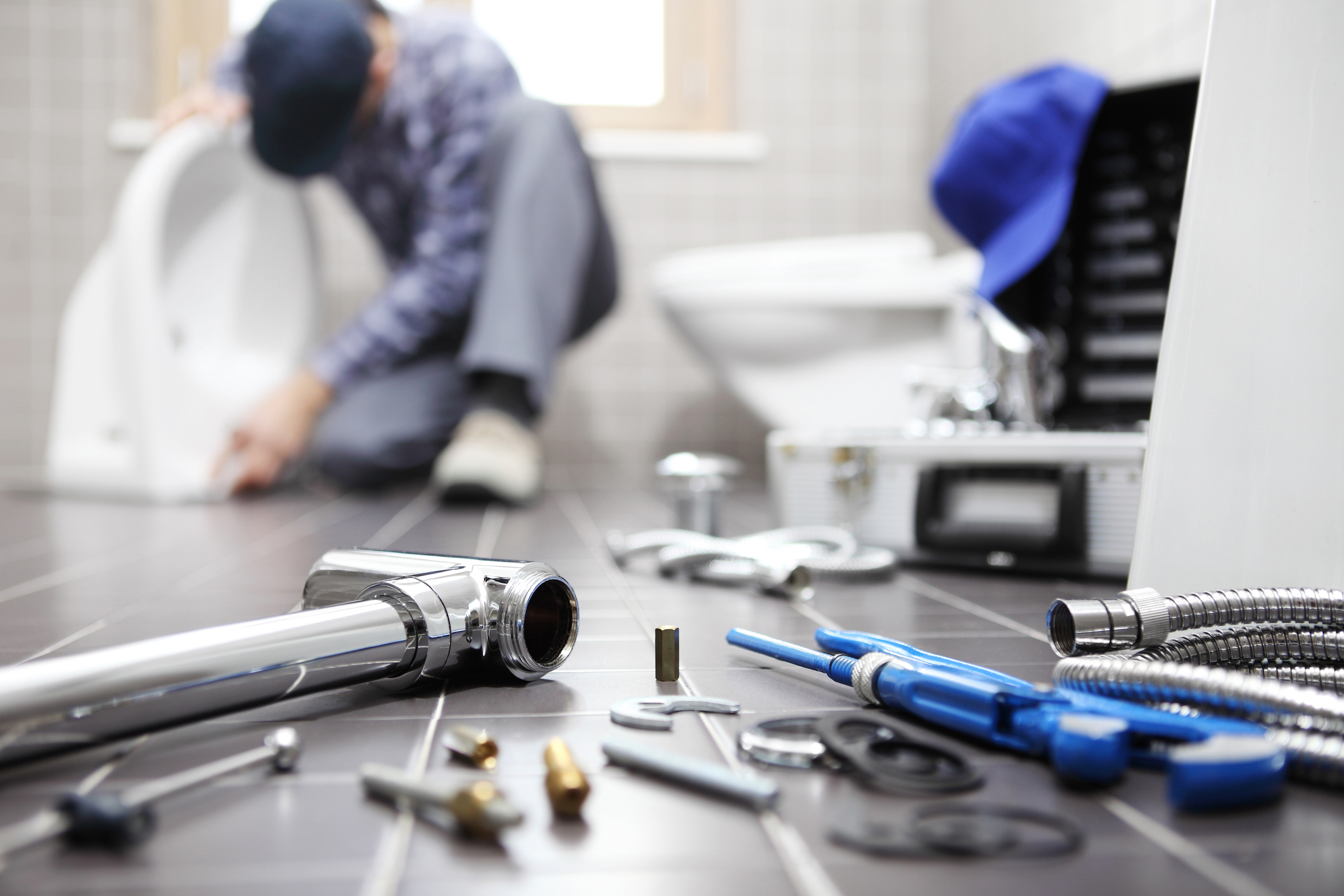 Plumber At Work In A Bathroom, Plumbing Repair Service, Assemble And Install Concept